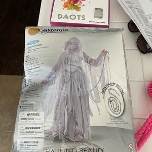 Brand new child’s Halloween costume and wig